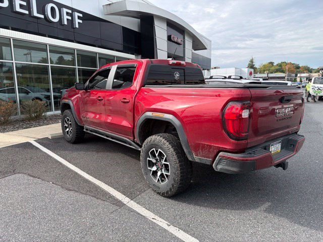 Used 2024 Volcanic Red Tintcoat GMC 4WD AT4X image 3