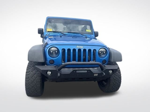Used 2015 Blue Jeep Unlimited Sport image 7
