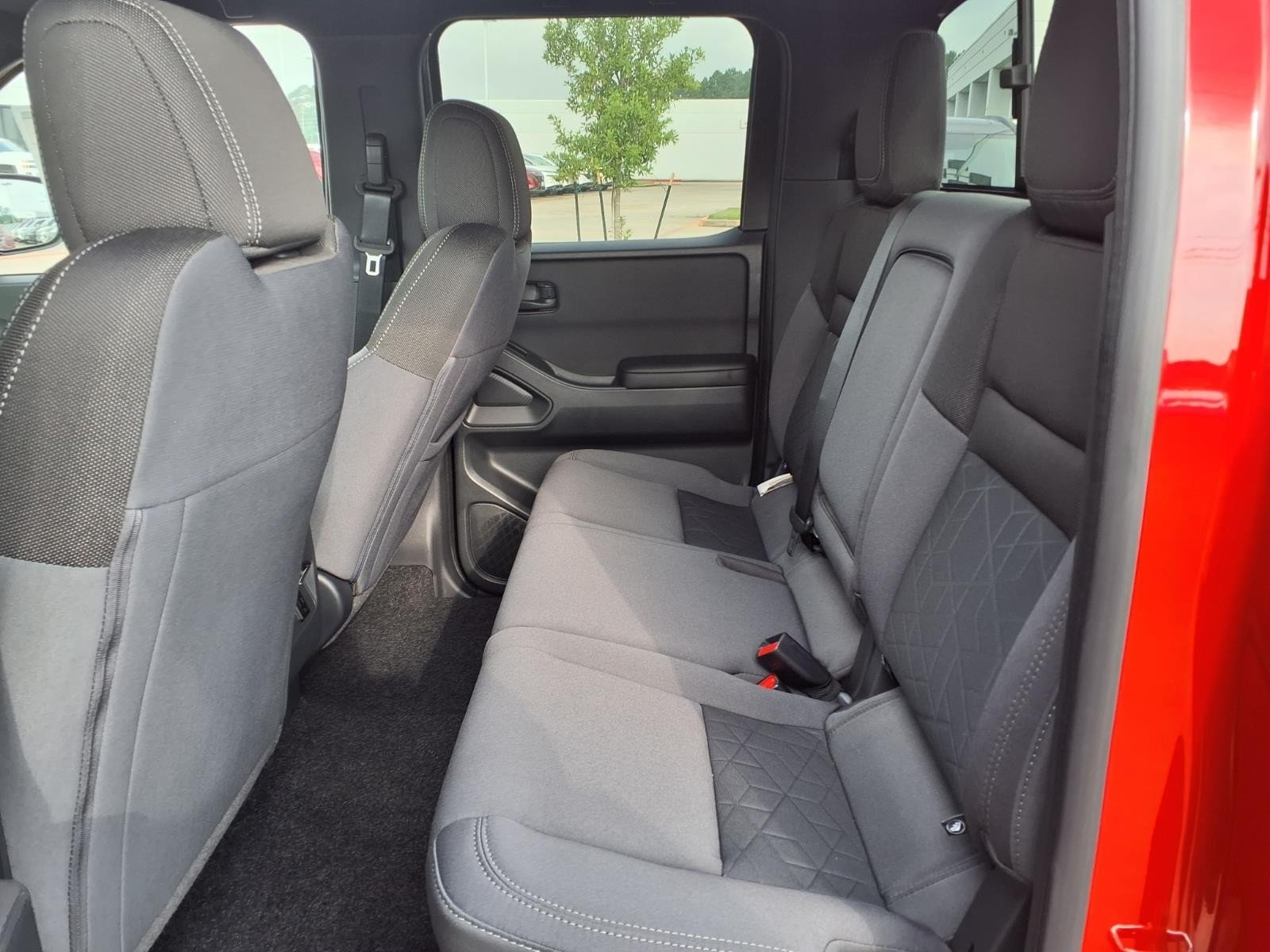 2026 Nissan Frontier SV Red at Robbins Nissan