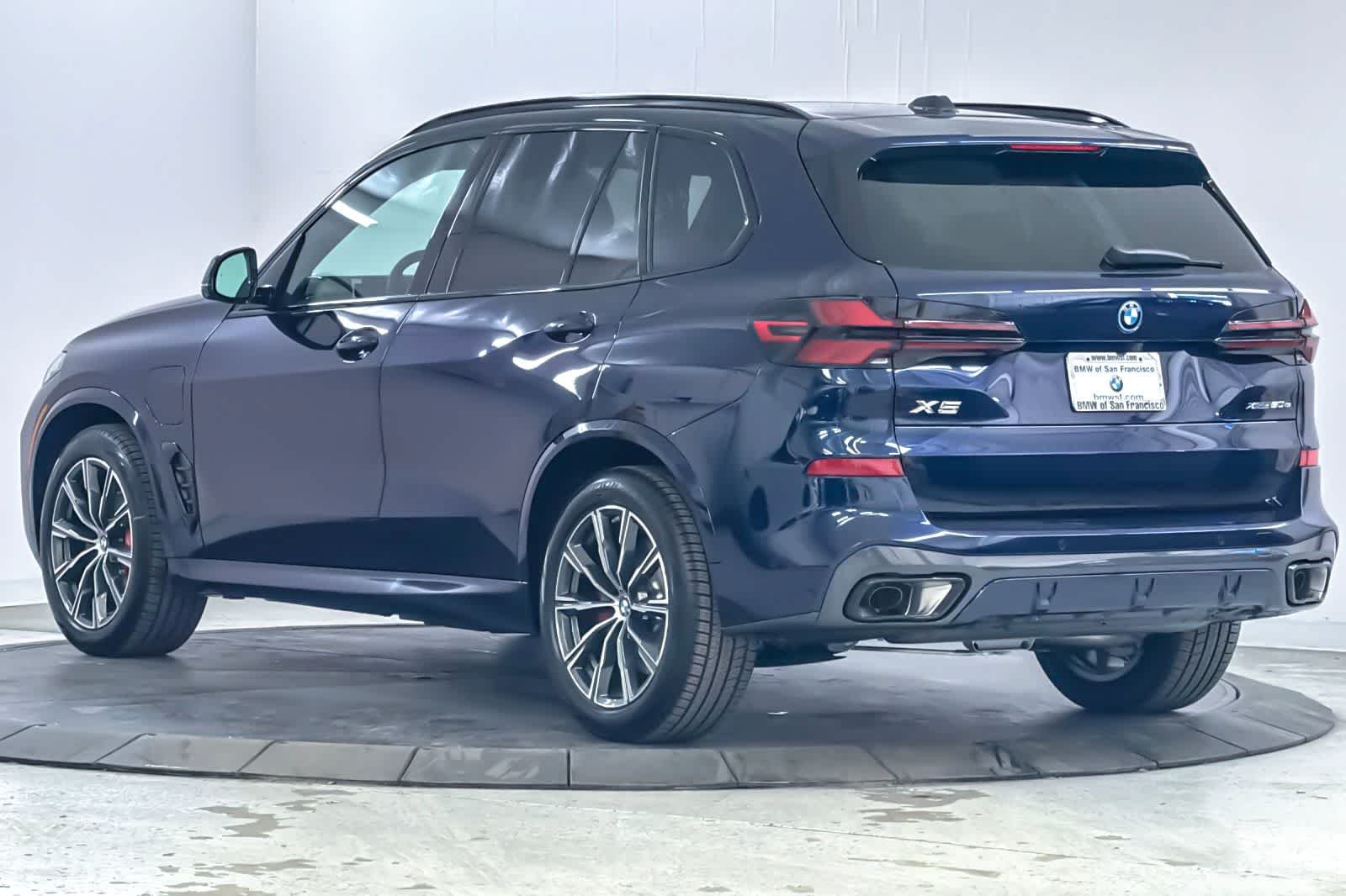 New 2026 Tanzanite Blue II Metallic BMW xDrive50e image 6