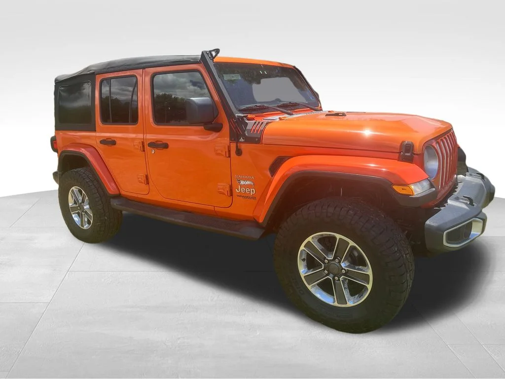 Used 2018 Orange Jeep Unlimited Sahara image 29