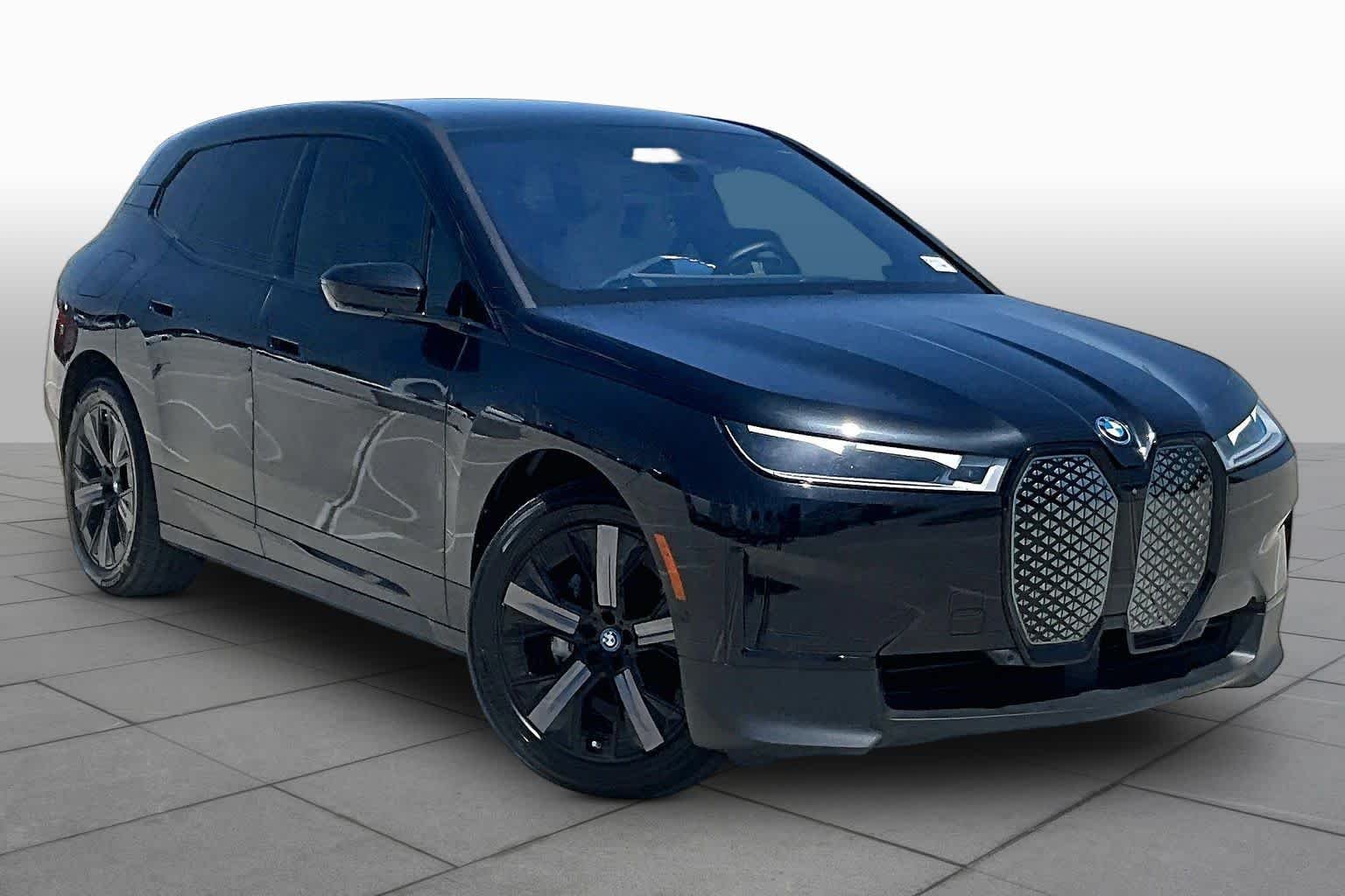 Used 2024 Black Sapphire Metallic BMW xDrive50 image 2
