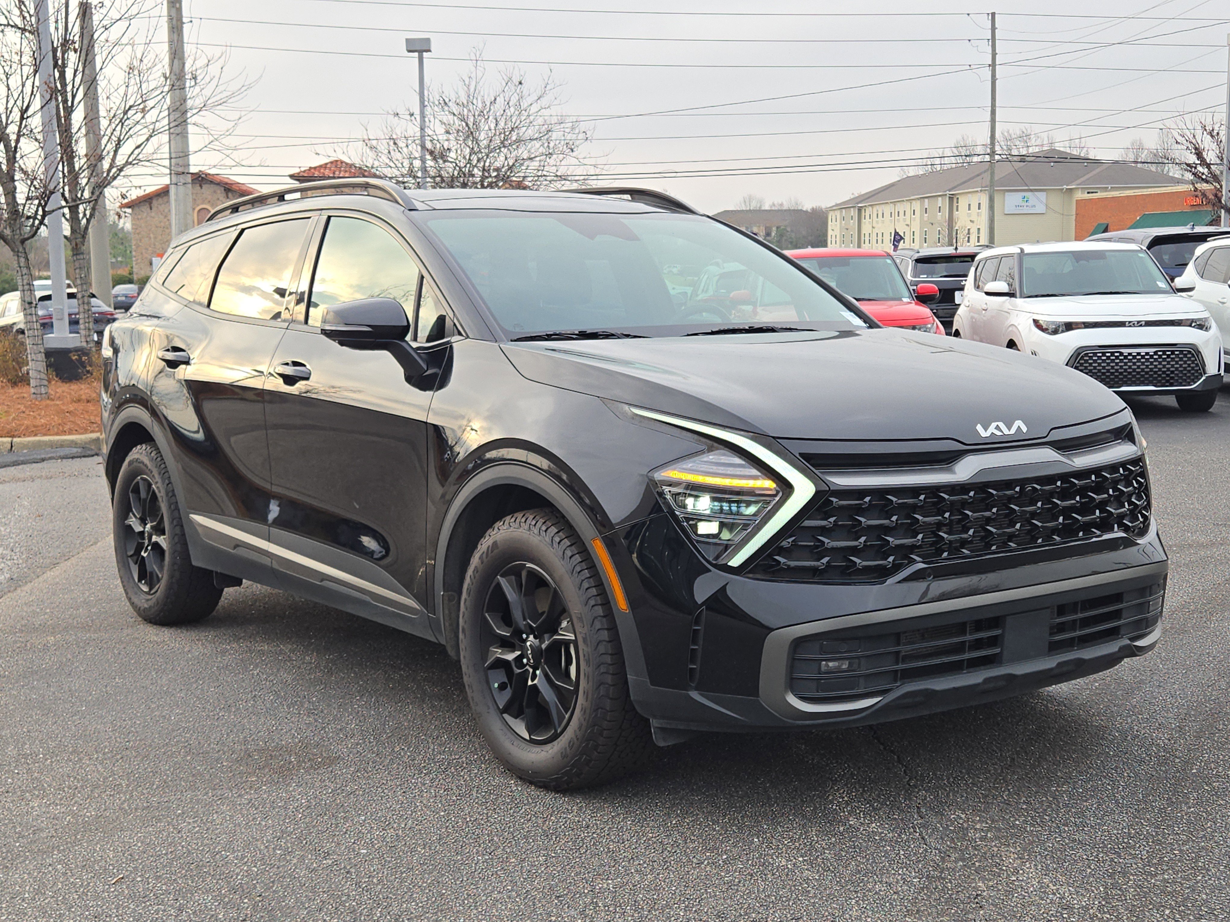 Used 2024 Ebony Black Kia X-Pro Prestige image 3