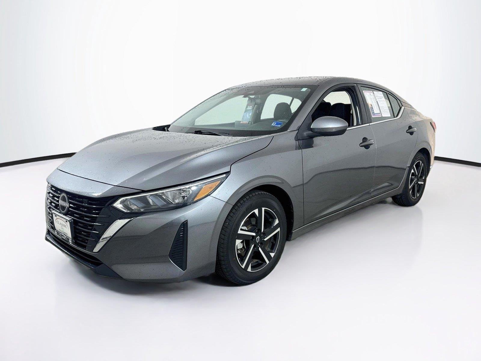 Used 2024 Gun Metallic Nissan SV image 1