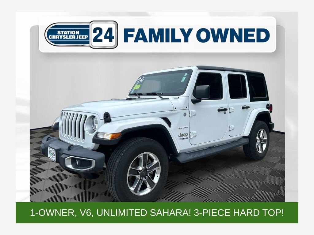 Used 2018 White Jeep Unlimited Sahara image 1