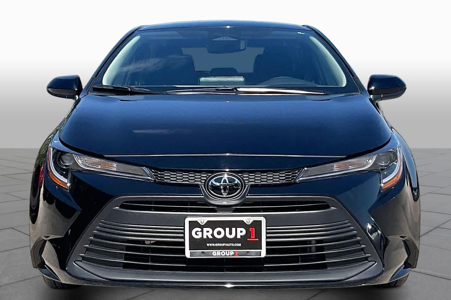 Used 2025 Midnight Black Metallic Toyota LE image 4