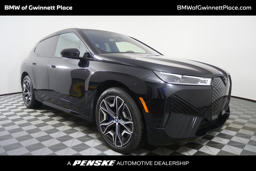 Certified Used 2024 Black Sapphire Metallic BMW xDrive50 image 1