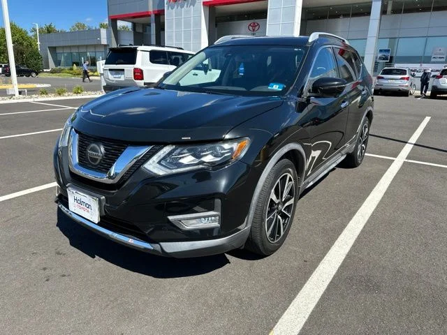 Used 2018 Black Nissan SL image 1