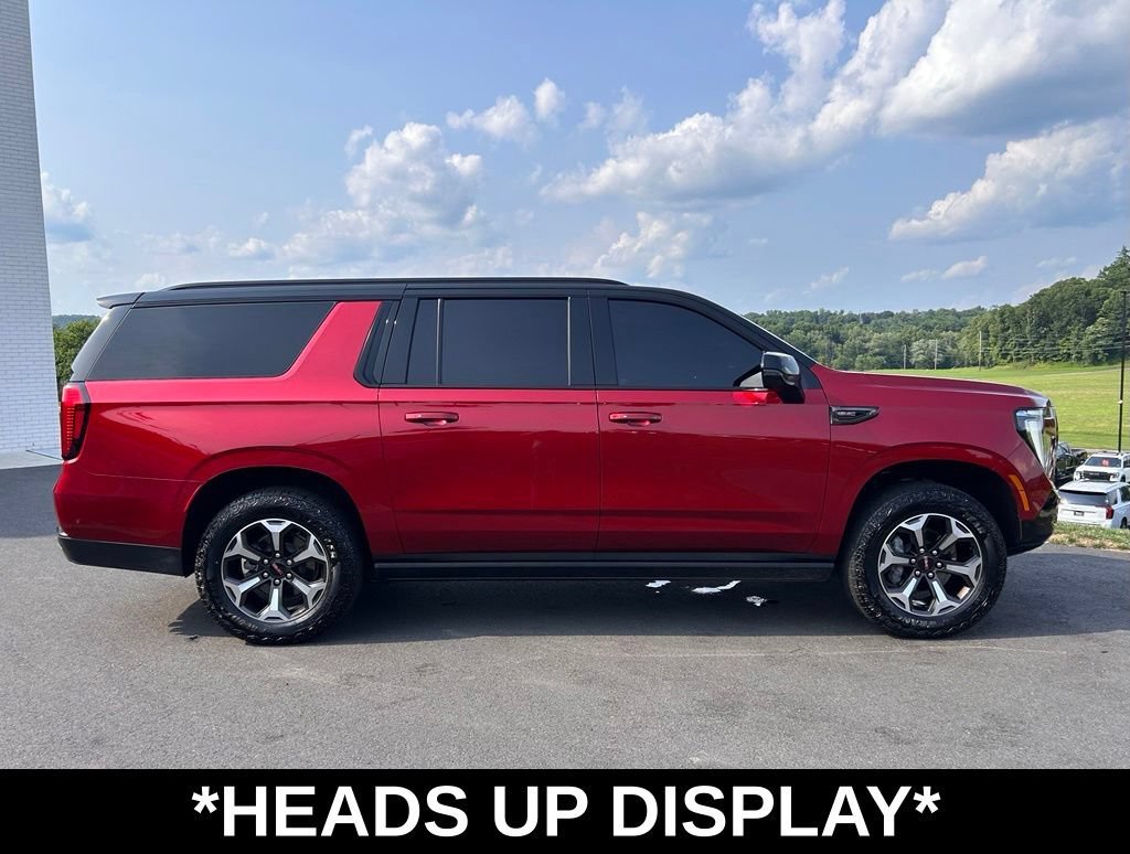 Used 2025 Volcanic Red Tintcoat GMC AT4 Ultimate image 13