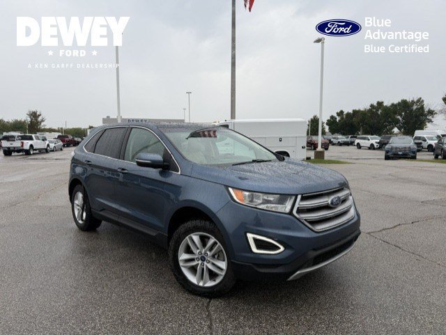Used 2018 Blue Metallic Ford SEL image 1