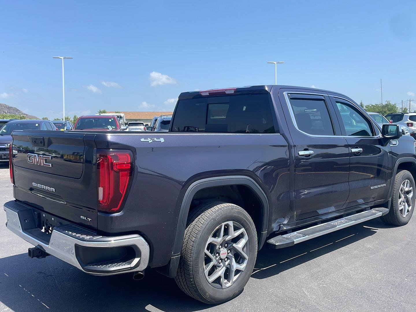 Used 2024 Titanium Rush Metallic GMC SLT image 8