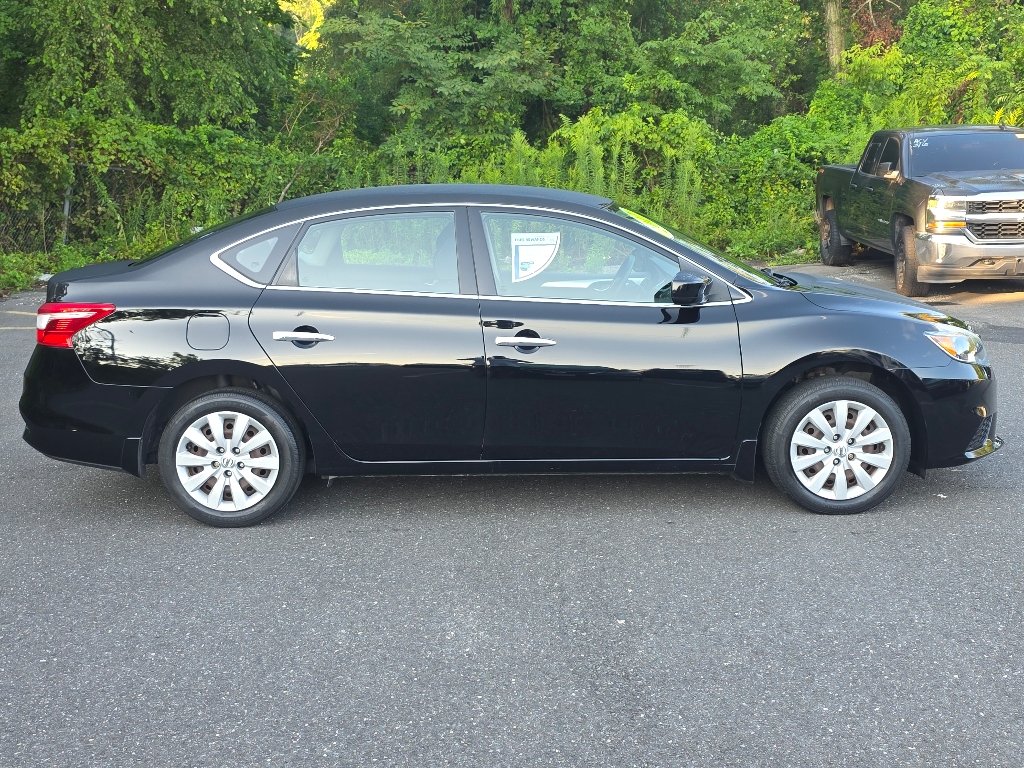 Used 2016 Super Black Nissan S image 13