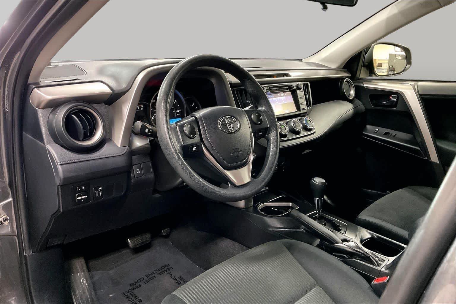 Used 2016 Magnetic Gray Metallic Toyota LE image 17