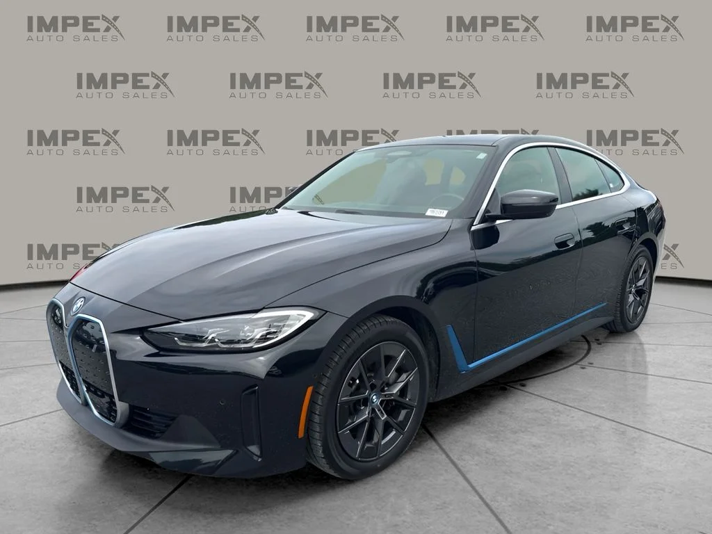Used 2023 Black BMW eDrive35 image 1