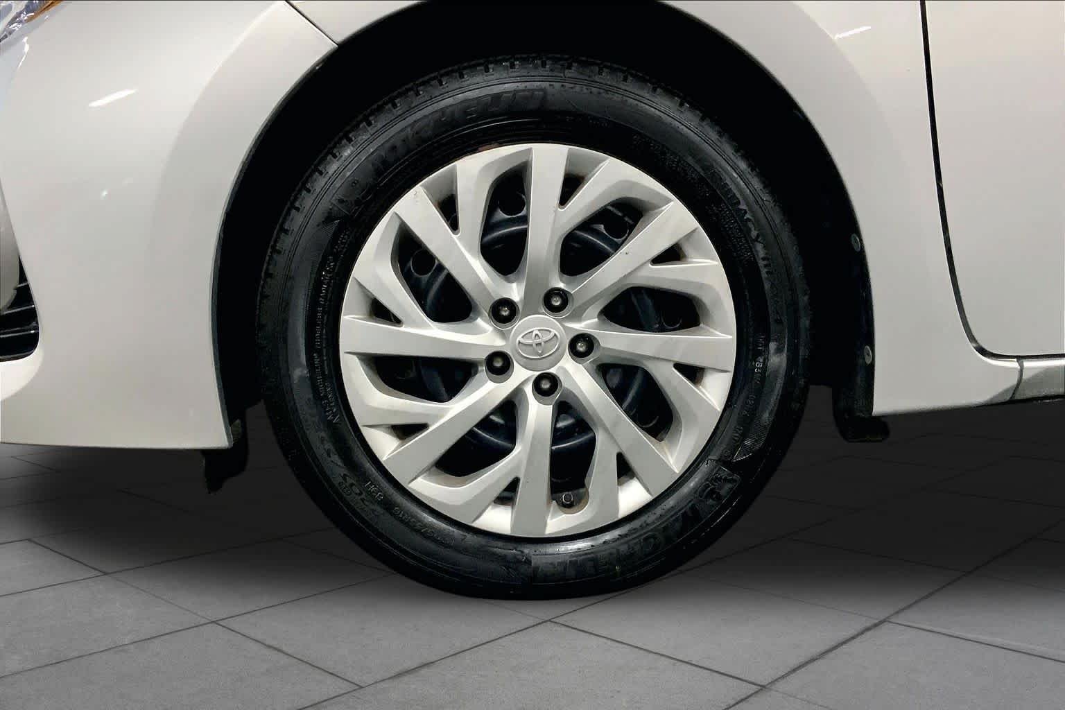 Used 2017 Classic Silver Metallic Toyota LE image 11