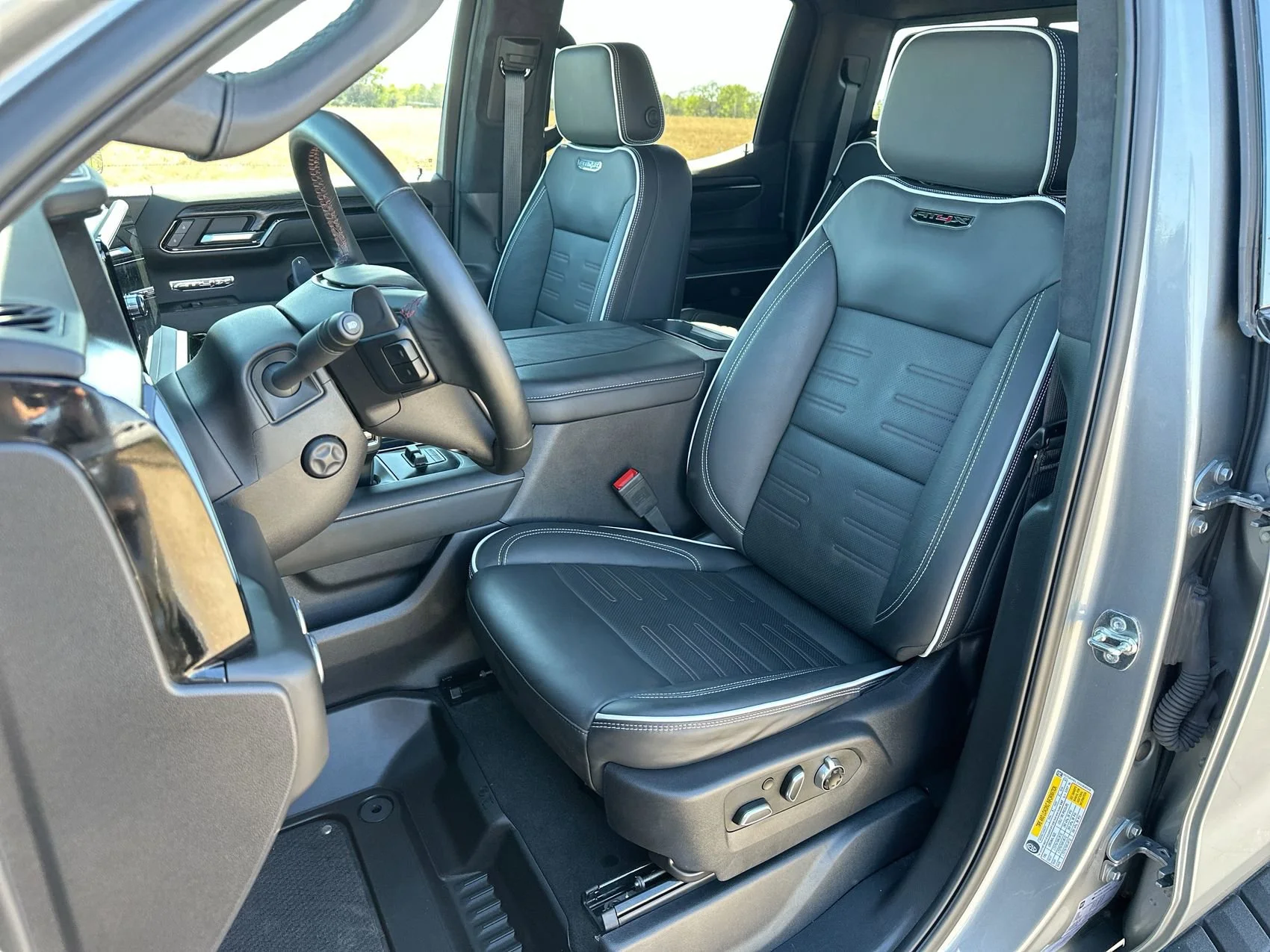 Used 2025 Sterling Metallic GMC AT4X image 11