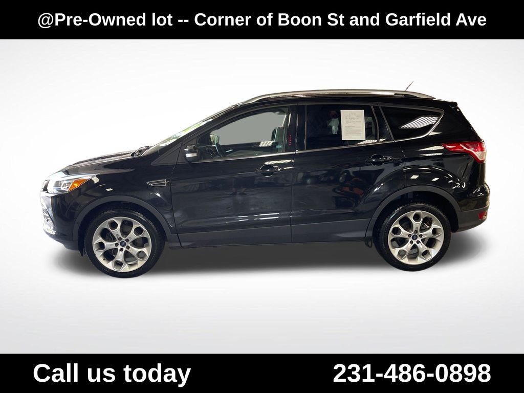 Used 2014 Ford Escape Titanium with VIN 1FMCU9J97EUB57362 for sale in Traverse City, MI