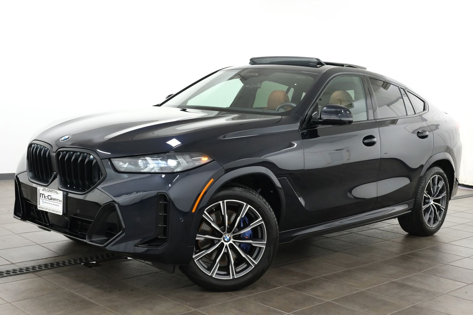 Certified Used 2024 Carbon Black Metallic BMW xDrive40i image 1