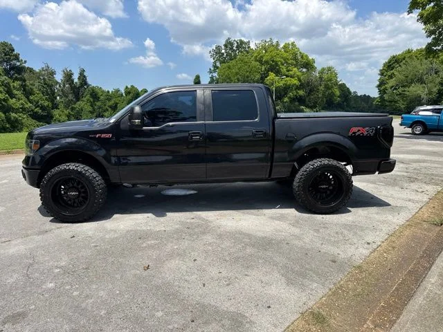 Used 2014 Black Ford FX4 image 4