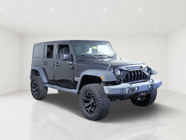Used 2017 Black Jeep Unlimited Sport image 1