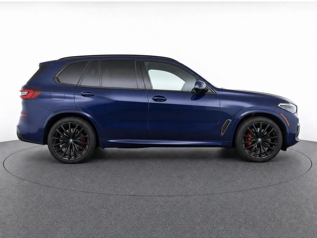 Used 2021 Tanzanite Blue II Metallic BMW M50i image 2