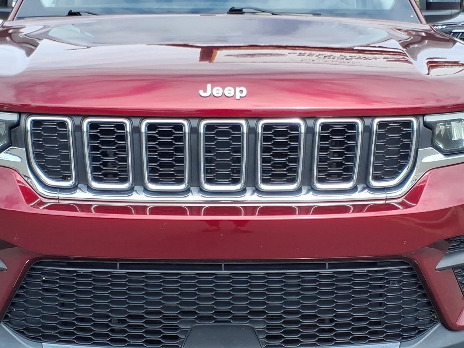 Used 2023 Velvet Red Pearlcoat Jeep Laredo image 14