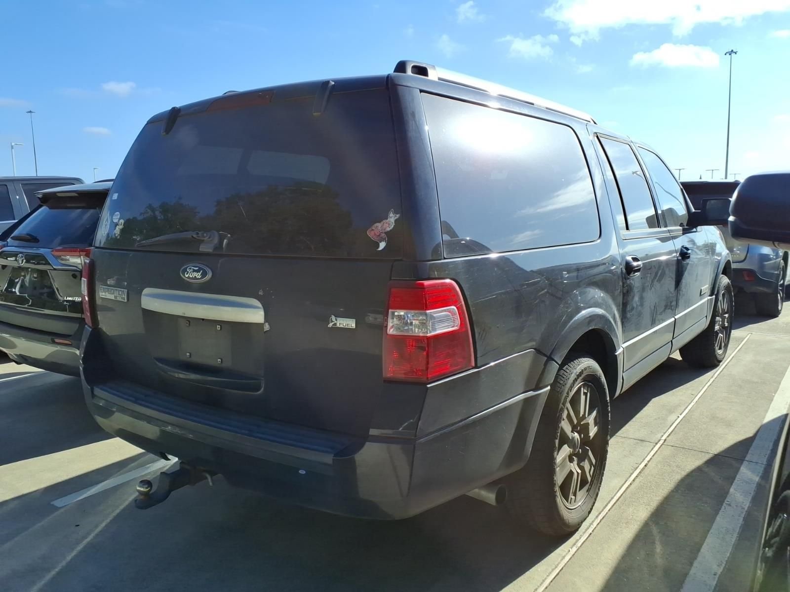 Used 2010 Tuxedo Black Metallic Ford Limited image 6