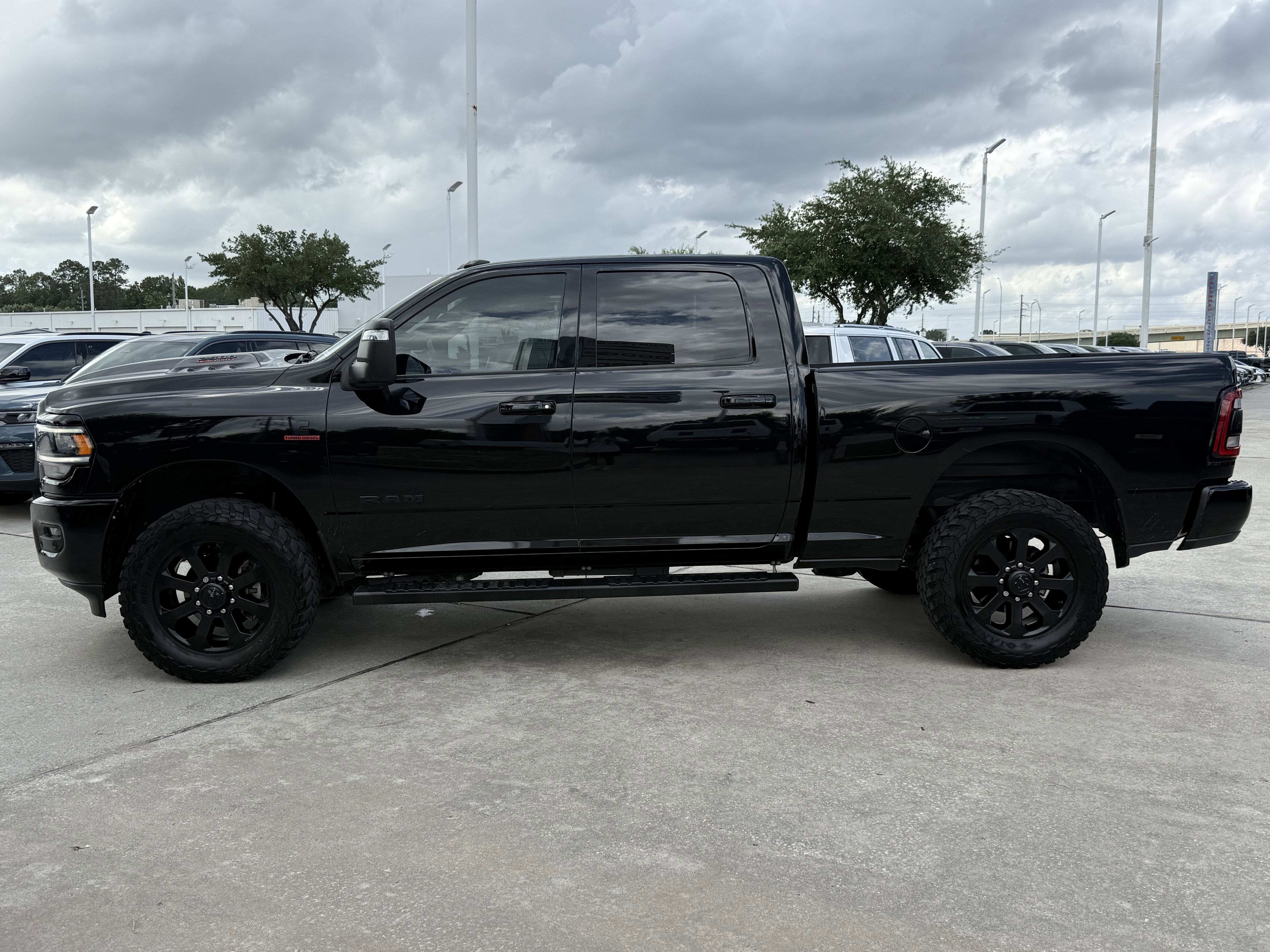 Used 2024 Diamond Black Crystal Pearlcoat Ram Laramie image 7