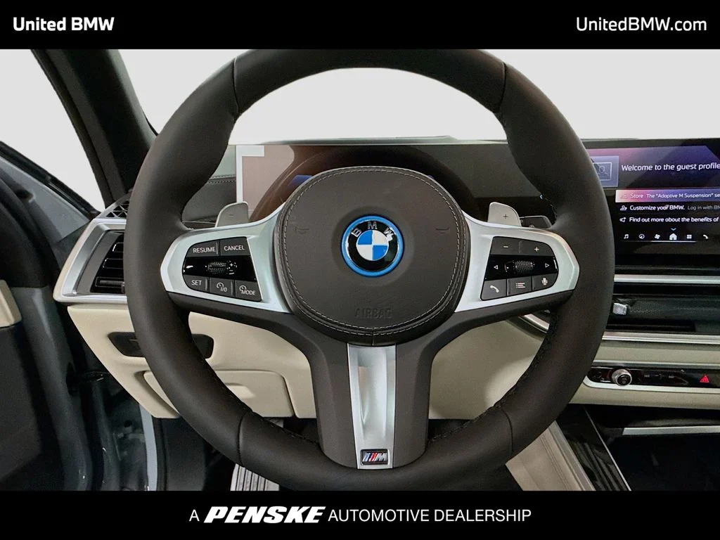 Used 2026 Brooklyn Grey Metallic BMW xDrive50e image 6