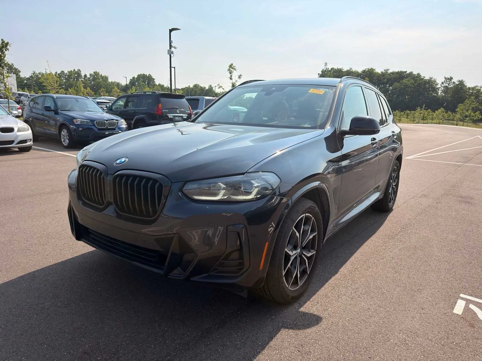 Certified Used 2024 Carbon Black Metallic BMW xDrive30i image 2