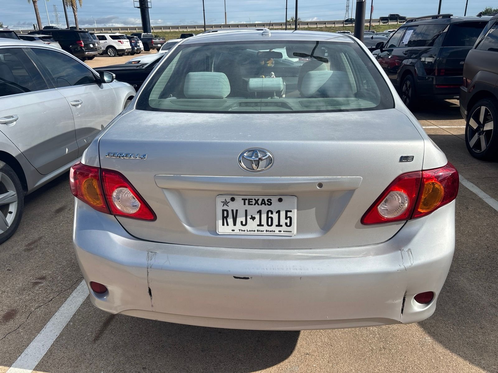 Used 2010 Classic Silver Metallic Toyota LE image 4