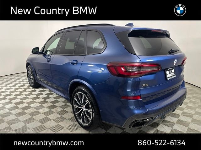 Used 2023 Phytonic Blue Metallic BMW M50i image 4