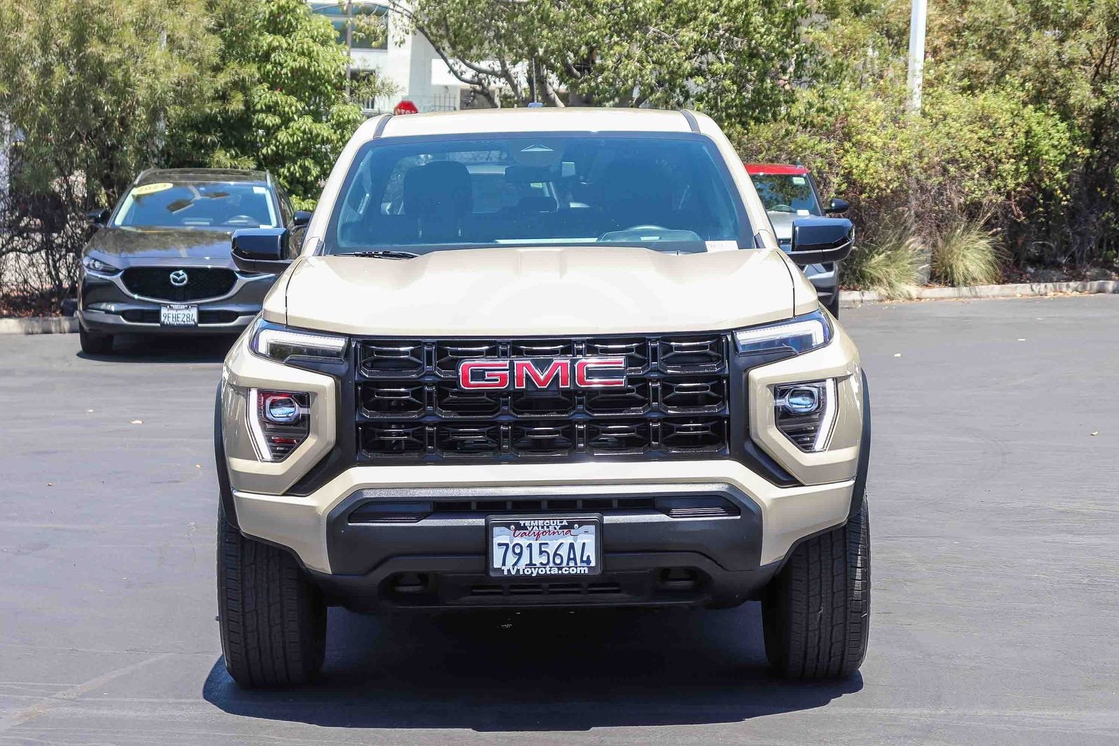 Used 2024 Desert Sand Metallic GMC Elevation image 2