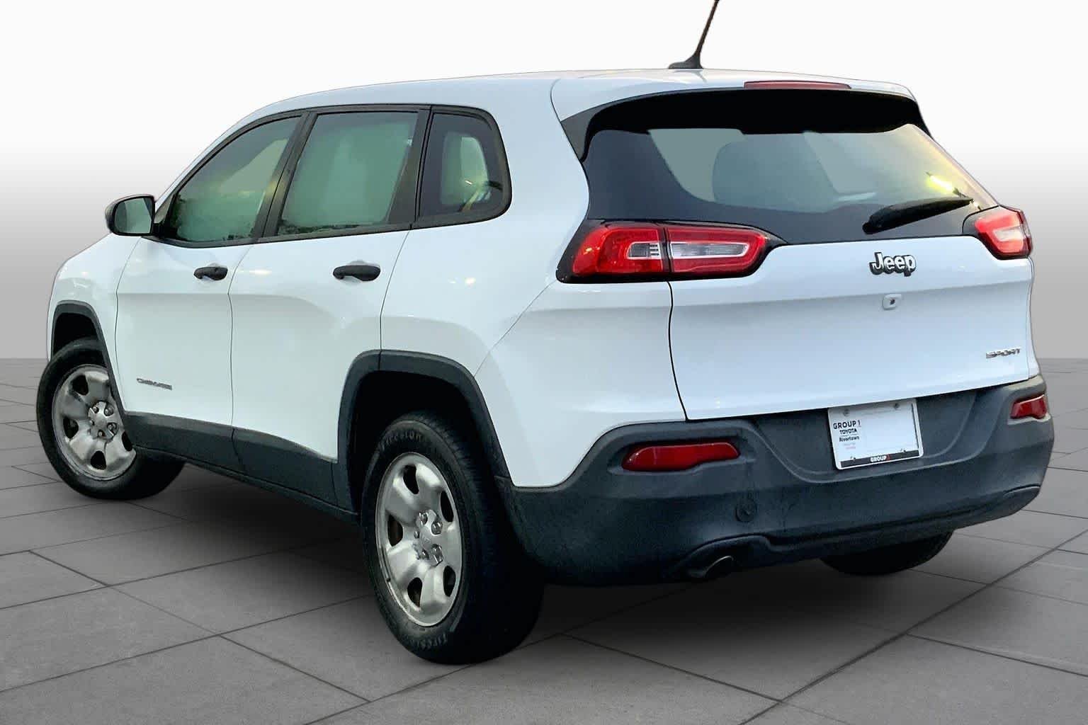 Used 2014 Bright White Clearcoat Jeep Sport image 12
