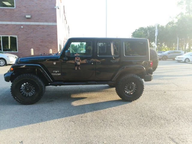 Used 2018 Black Jeep Unlimited Sahara image 3
