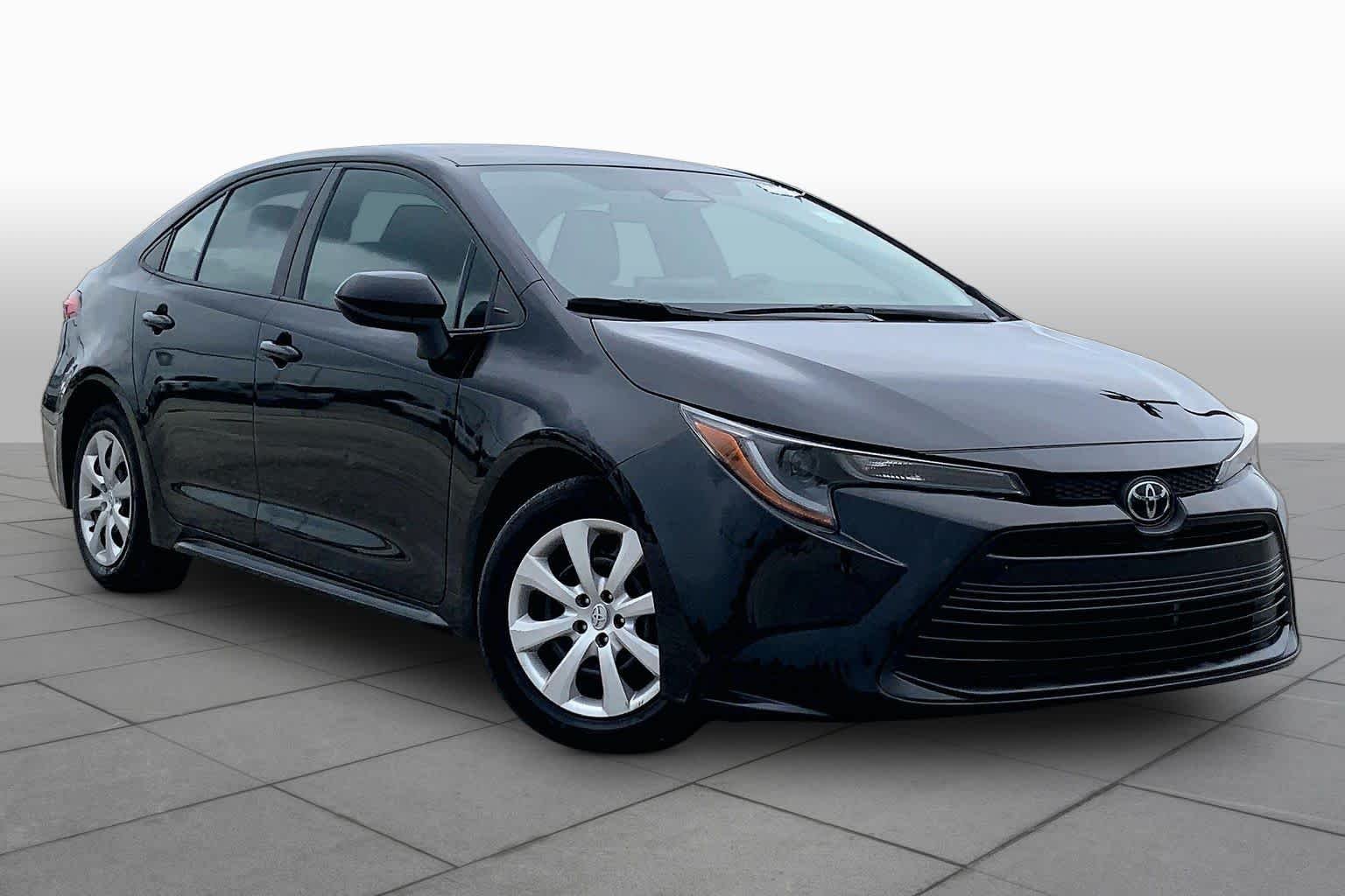Used 2024 Midnight Black Metallic Toyota LE image 3