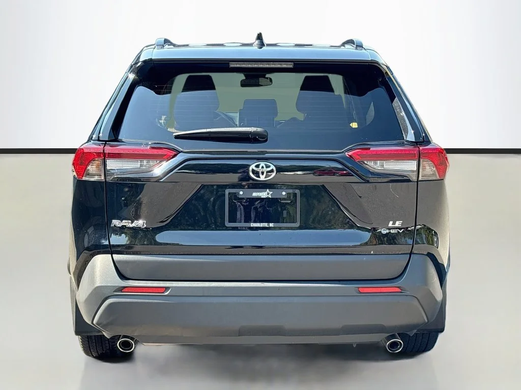 Used 2025 Midnight Black Metallic Toyota LE image 3