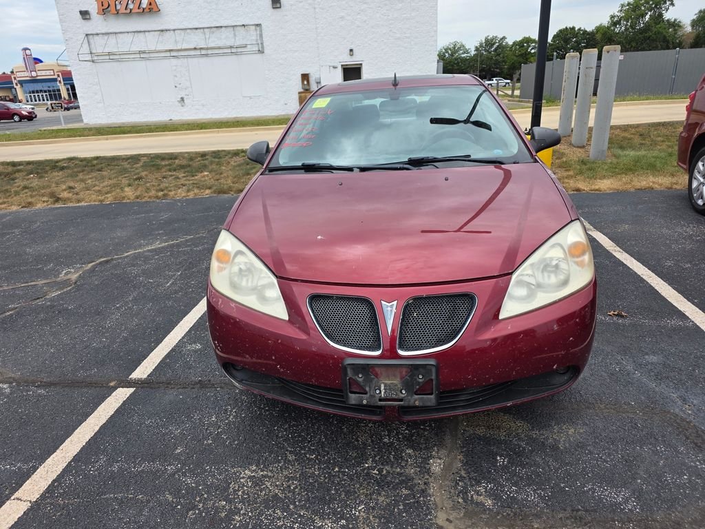 Used 2009 Performance Red Metallic Pontiac GT image 1