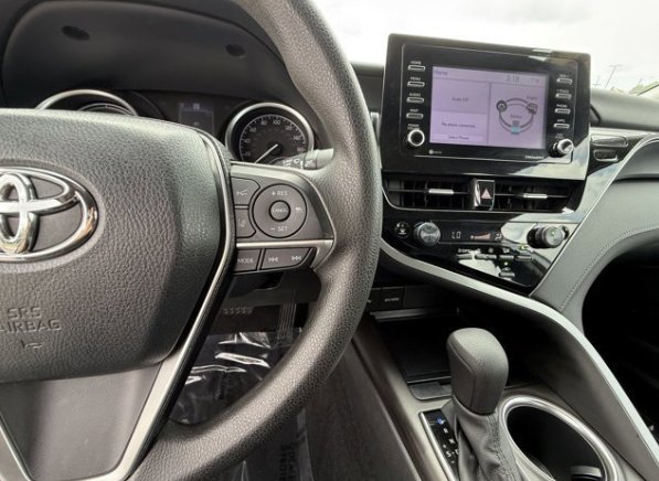 Used 2024 Celestial Silver Metallic Toyota Hybrid LE image 6