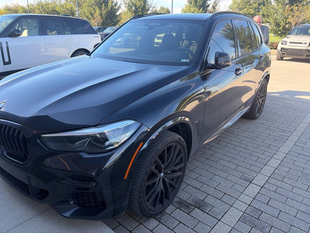 Used 2023 Black Sapphire Metallic BMW xDrive40i image 1