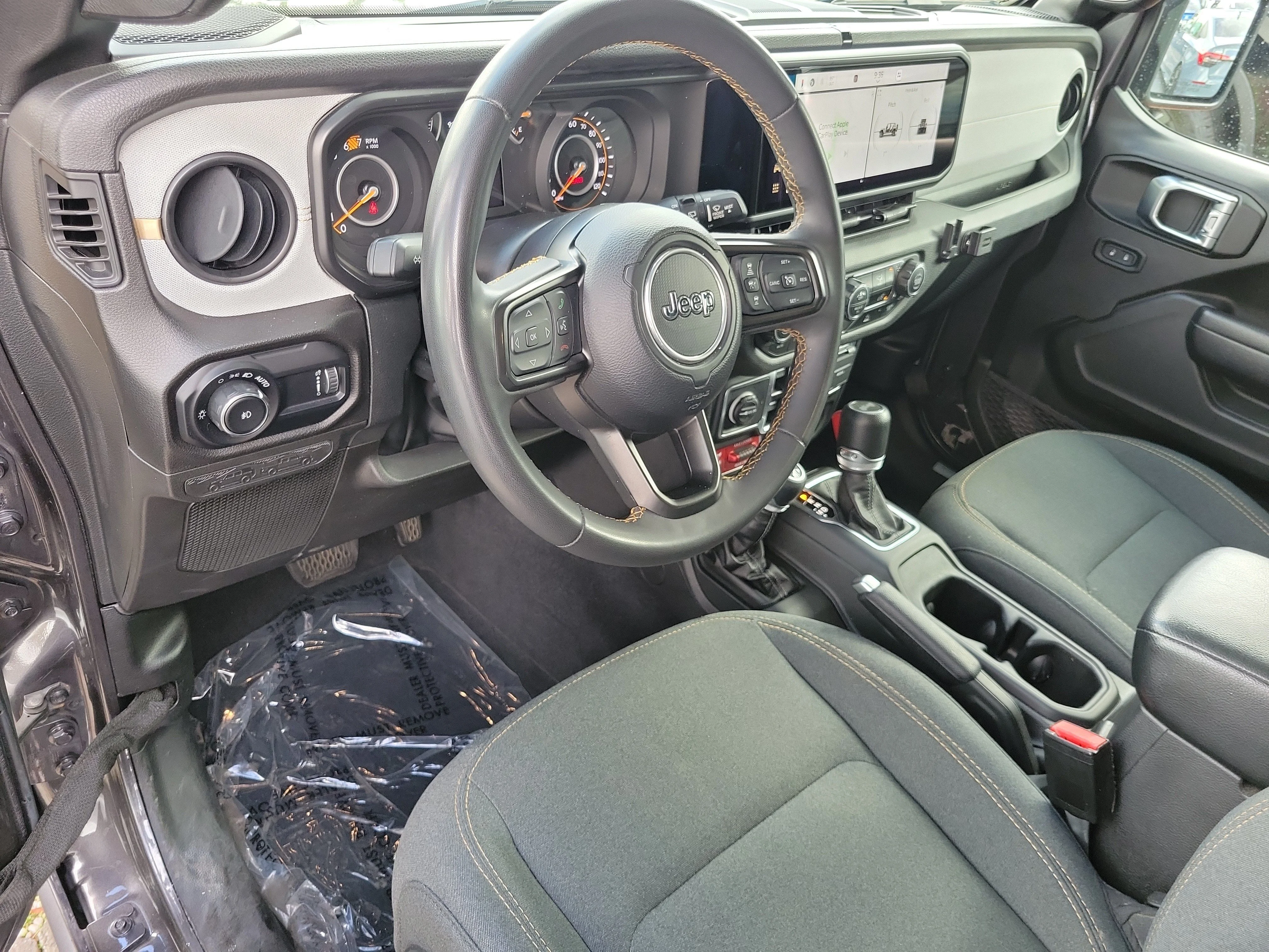 Used 2024 Granite Crystal Metallic Clearcoat Jeep Sport image 19