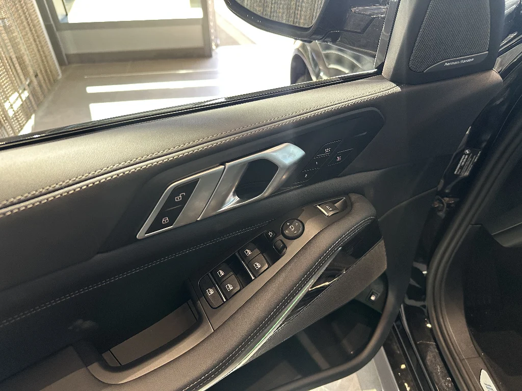 New 2026 Black Sapphire Metallic BMW xDrive50e image 11