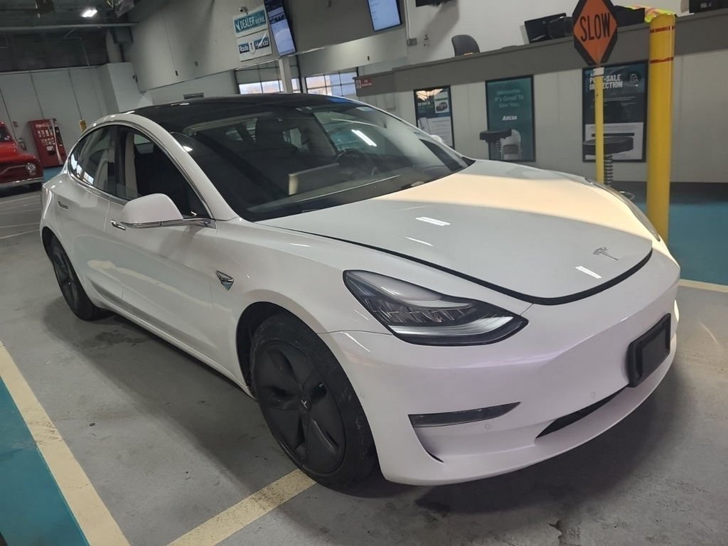 Used 2019 Tesla Model 3 Mid Range with VIN 5YJ3E1EA9KF309766 for sale in Parma, OH