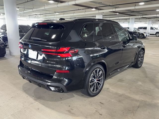 New 2026 Black Sapphire Metallic BMW xDrive50e image 7