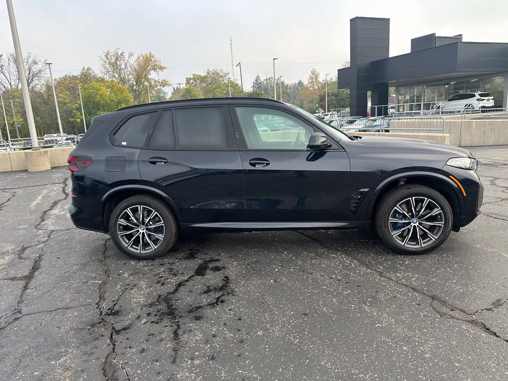 Used 2024 Carbon Black Metallic BMW xDrive50e image 4