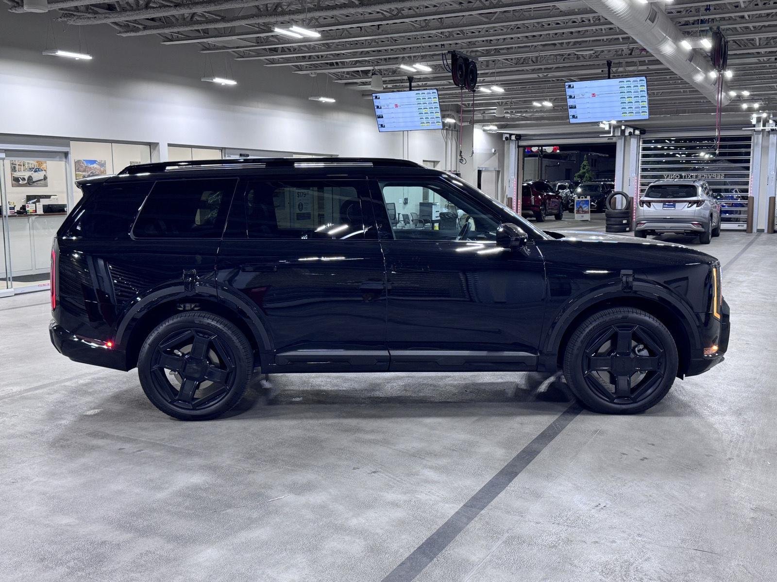 Used 2027 Ebony Black Kia X-Line EX image 9