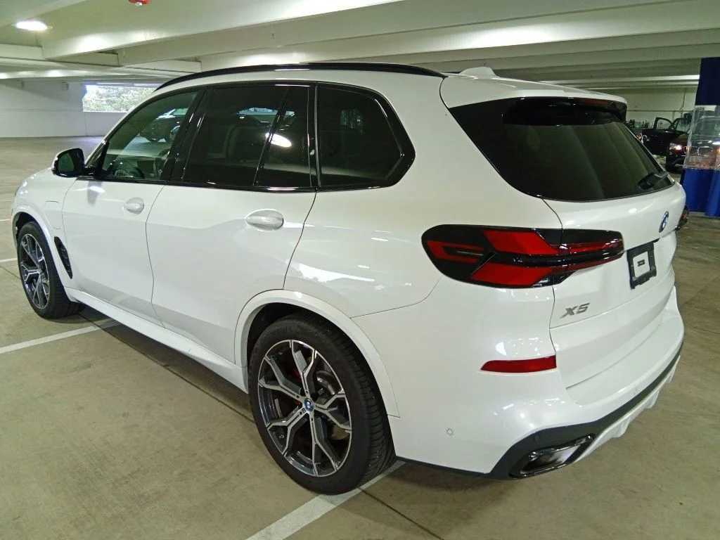 Used 2025 Mineral White Metallic BMW xDrive50e image 7