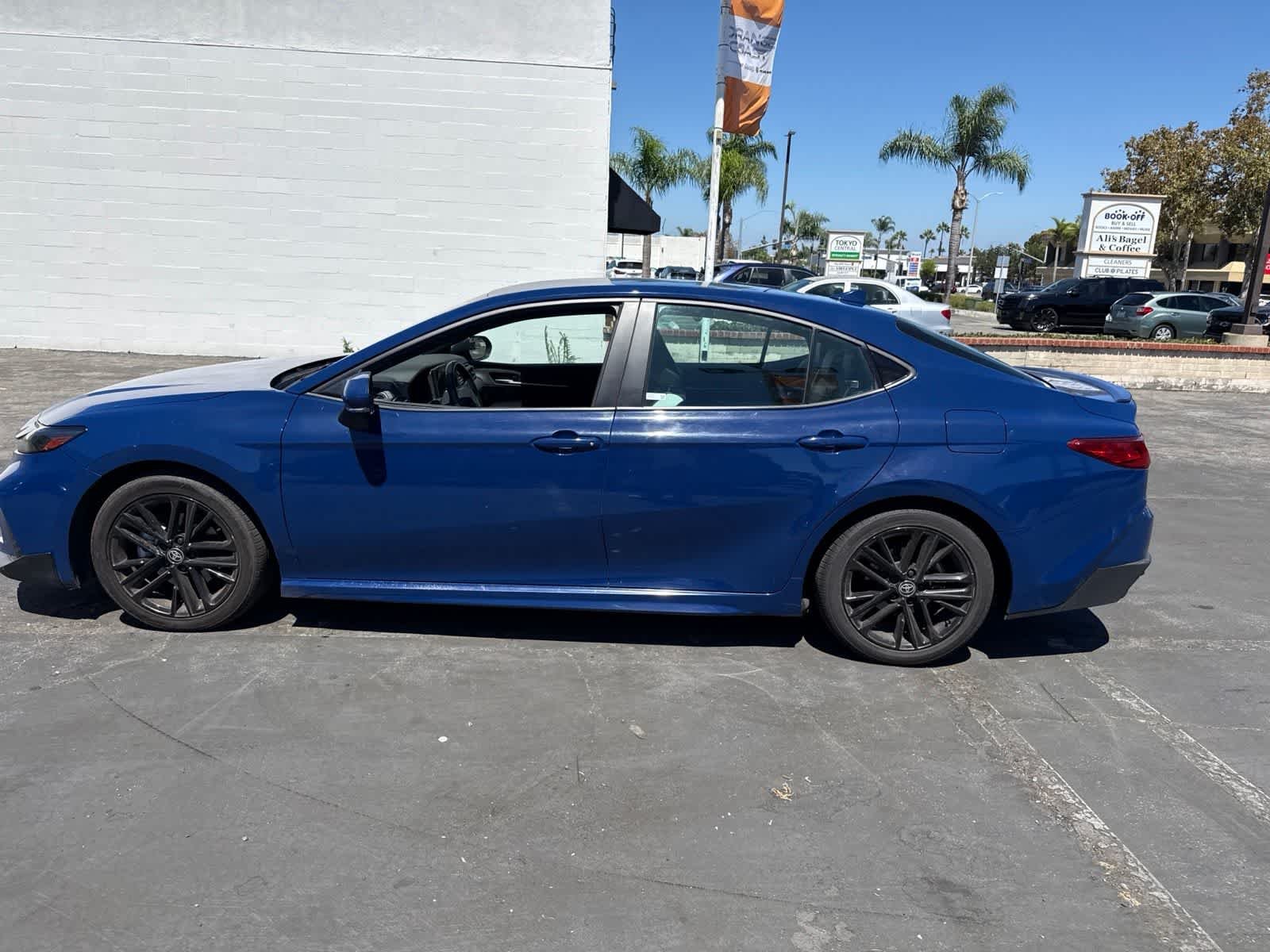 Used 2025 Reservoir Blue Toyota SE image 23
