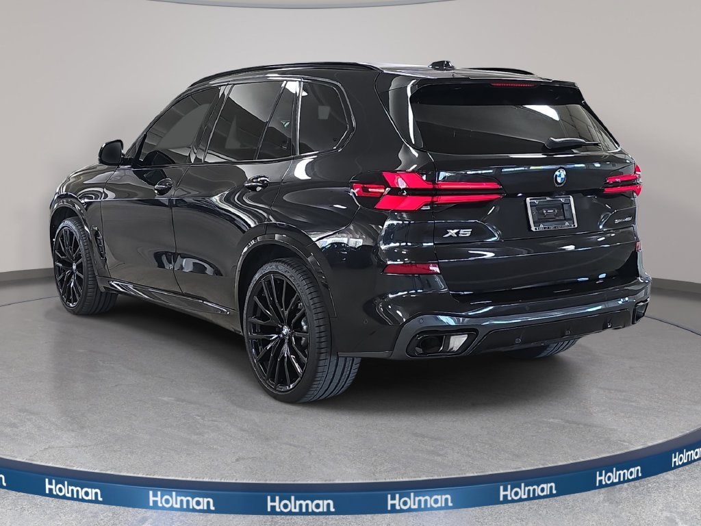 Certified Used 2025 Black Sapphire Metallic BMW sDrive40i image 9