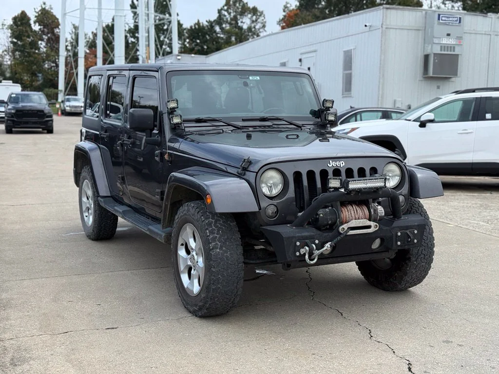Used 2014 Gray Jeep Unlimited Sahara image 4
